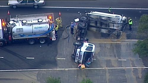 Emergency services at the scene this morning. The motorists involved in the crash are believed to have escaped any major injuries. (9NEWS)