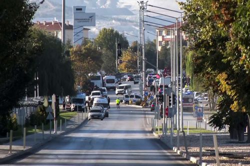 Emergency rescue teams and police officers work outside of Turkish Aerospace Industries Inc. on the outskirts of Ankara, Turkey, Wednesday, Oct. 23, 2024. 