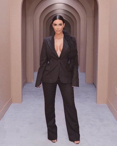 Kim Kardashian in a suit, studying law