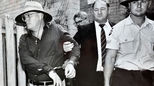 David Harold Eastman is arrested and handcuffed and is led to a police vehicle, outside his flat in Reid in 1992