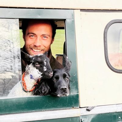 James Middleton with his little lamb and one of his many dogs