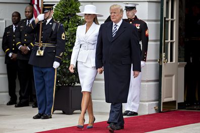 Melania and Donald Trump white hat