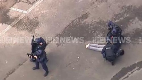 Two people arrested after siege outside pub in Geelong 