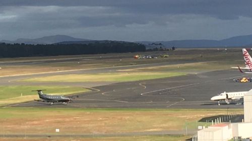 Debris can be seen on the runway at Hobart Airport. (Twitter via Georgia Westgarth)