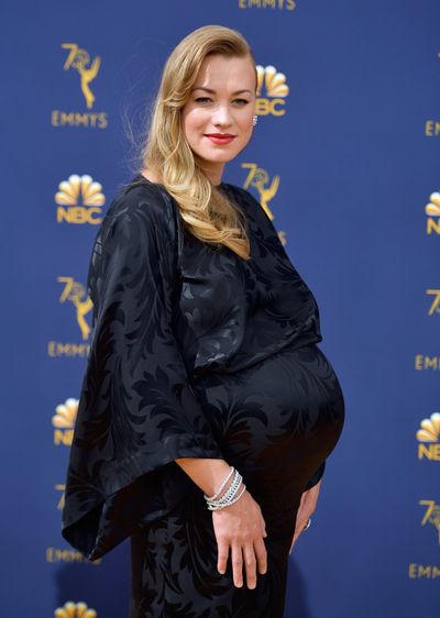 <p>Australian actress, Yvonne Strahovski stuns on the red carpet at the 2018 Emmy Awards. Despite being ready to give birth any day now the 36-year-old actress glows in a floor-length black satin number with bold red lips to match.&nbsp;</p>
<p>Strahovski has gone from being a budding actress to the breakout star of Hulu original series&nbsp;<em>The Handmaid&rsquo;s Tale </em>and is up for her&nbsp;first-ever Emmy Award at this year's event.</p>
<p>The Sydney-born star is up against industry heavyweights Vanessa Kirby (The Crown), Thandie Newton (Westworld), and&nbsp;Handmaid&rsquo;s co-star Alexis Bledel, for the title of Best Supporting Actress in a Drama Series.</p>
<p><br />
The&nbsp;2018 Emmy Awards&nbsp;take place on September 17 at the Microsoft Theatre in Los Angeles.</p>
<p>The LA-based actress (and her bump) is known for her signature casual-cool style.</p>
<p>Kaufman Franco and Ester Abner are just some of the designers that Strahovski has been snapped in, and she is also known for her fondness for accessories from Jimmy Choo, Manolo Blahnik and Bulgari.</p>
<p>Whether or not Strahovski takes home a trophy, in our eyes she&rsquo;s always been a winner in the style stakes.</p>
<p>Click through to see Yvonne Strahovski&rsquo;s best red-carpet moments.</p>
<p><em>&nbsp;</em></p>
