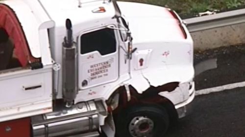 Two cars and a truck collided on Hopkins Road, Truganina, around 6am. (9NEWS)