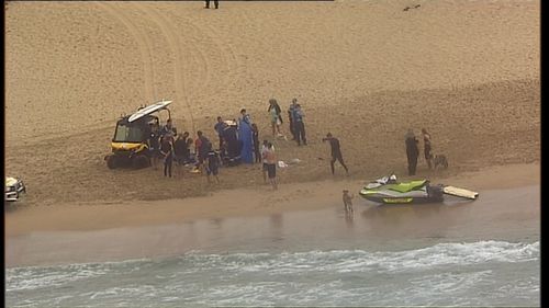 The man, believed to be aged in his 40s, was unable to be revived after he was dragged from the ocean and a bystander began CPR.