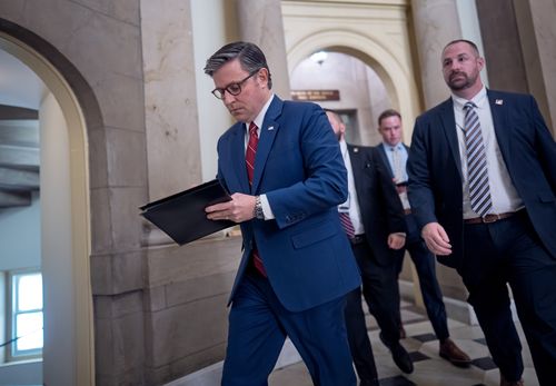 Speaker of the House Mike Johnson, R-La., heads from his office to the chamber for the final vote to bring the longest government shutdown in history to an end, at the Capitol in Washington, Wednesday, Nov. 12, 2025. (AP Photo/J. Scott Applewhite)