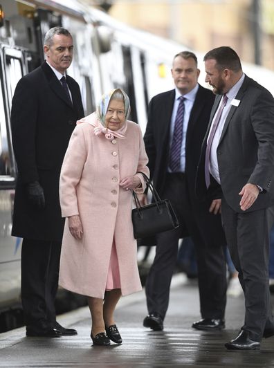 Britain's Queen Elizabeth arrives at King's Lynn railway station in Norfolk, after travelling from London at the start of her traditional Christmas break, which will be spent on the Royal estate at Sandringham