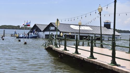 The Marine Museum of Puerto Bolivar, detached from the dock, is partially inundated in water after an earthquake that shook Machala, Ecuador, Saturday, March 18, 2023. 