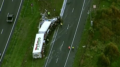 A truck has rolled on Sydney's Westlink M7. (9NEWS)