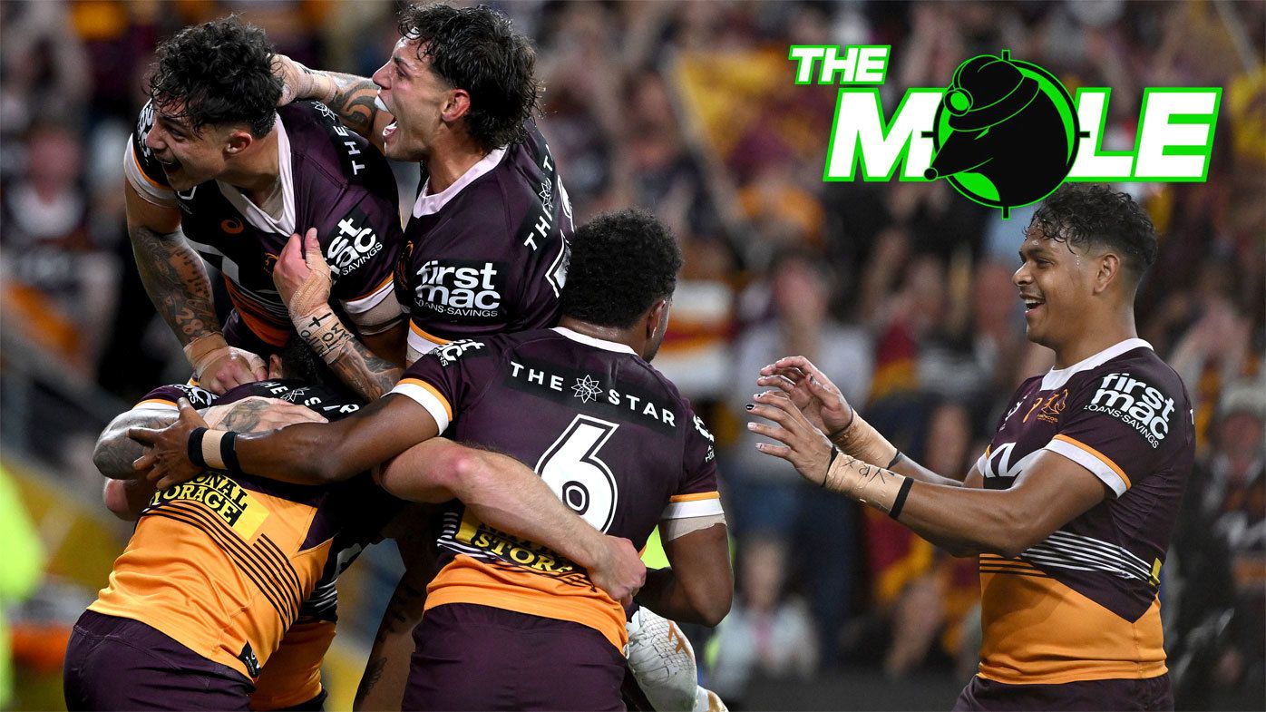 Broncos players celebrate a Billy Walters try against the Warriors in the preliminary final.