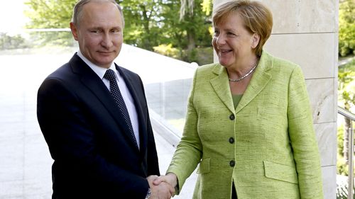 Merkel meets with Putin on rare Russia visit