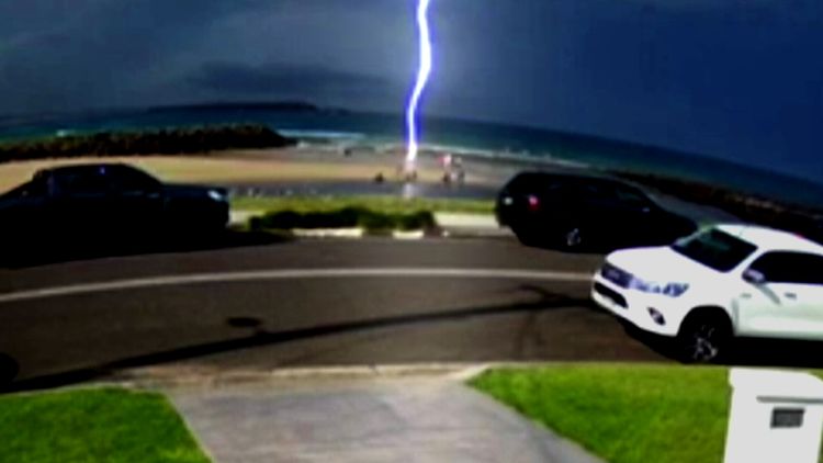 Lightning strike: Moment lightning strikes boy in 'extreme freak accident'  on NSW beach