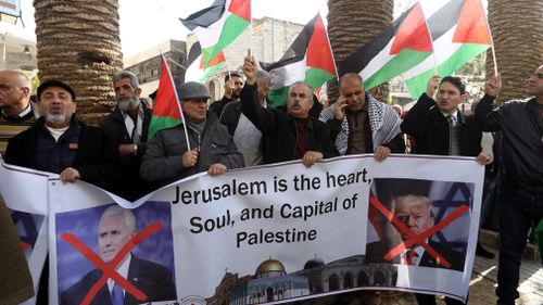 Palestinians attend a protest against the visit of US Vice President Mike Pence to Israel, in the West Bank city of Nablus. (AAP)