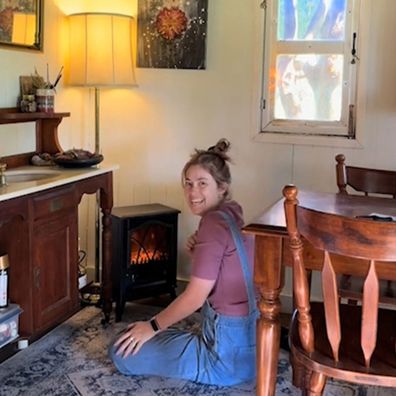 Kmart electric fireplace heater added to a cabin for warmth and ambience in winter