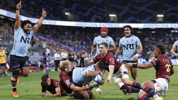 Siosifa Amone of the Waratahs score a try.