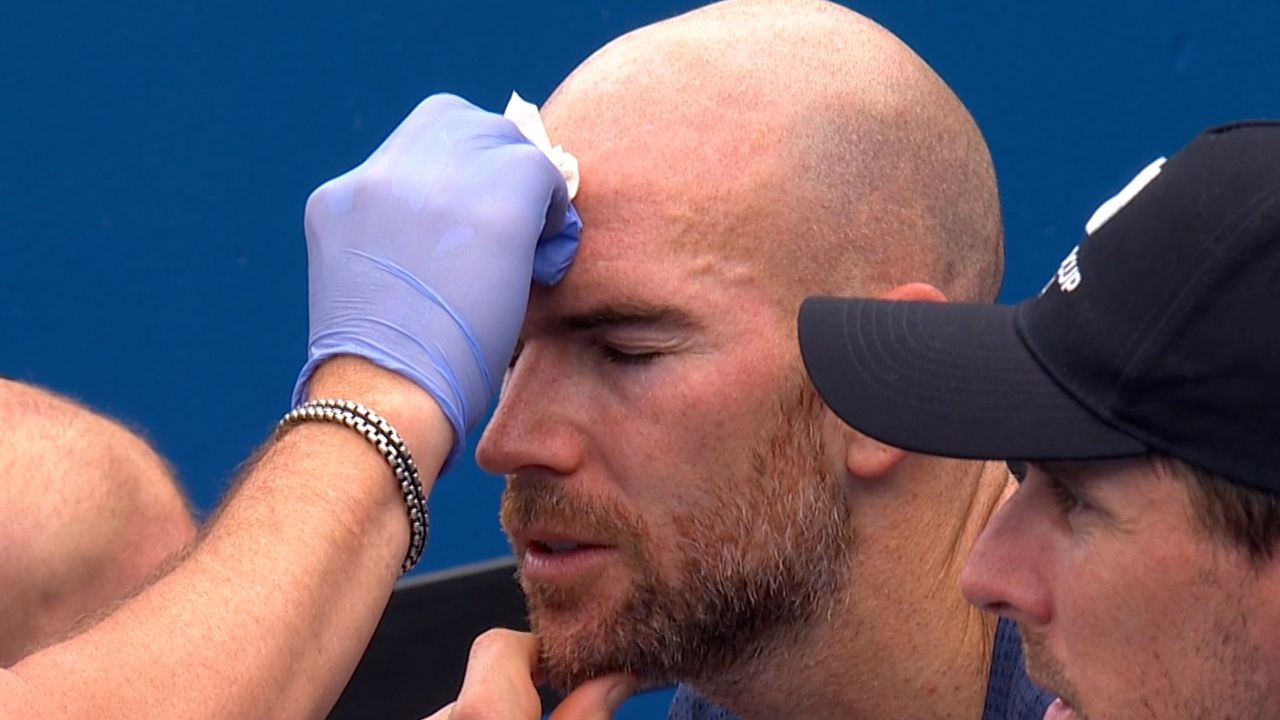 Adrian Mannarino hit himself with the butt of his racquet, causing his forehead to bleed.