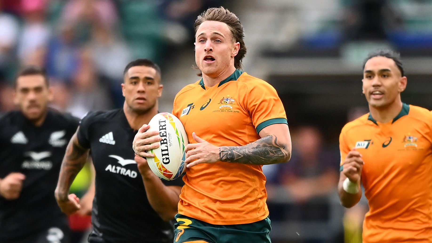 Corey Toole of Australia makes a break during the final between New Zealand and Australia at the London Sevens.