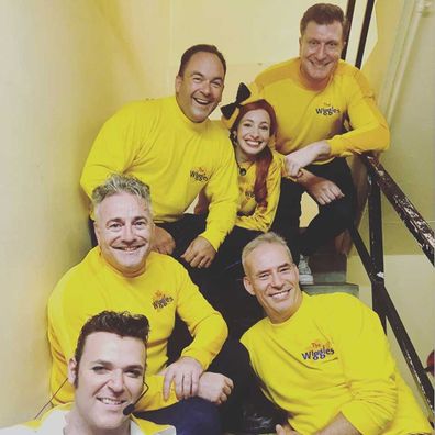 The band wear yellow to honour Greg Page at the second bushfire relief concert in Sydney.