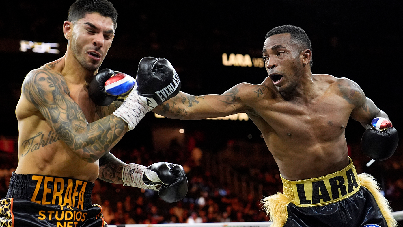 Erislandy Lara hits Michael Zerafa, in their middleweight title bout.