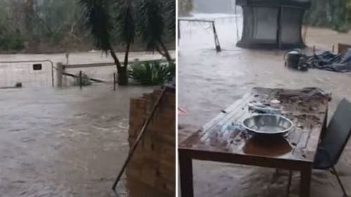 A Queensland family has had a lucky escape as a raging river swallowed the backyard of their home.
