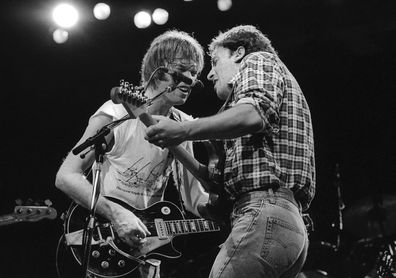 (L-R) Neil Young and Bruce Springsteen 
