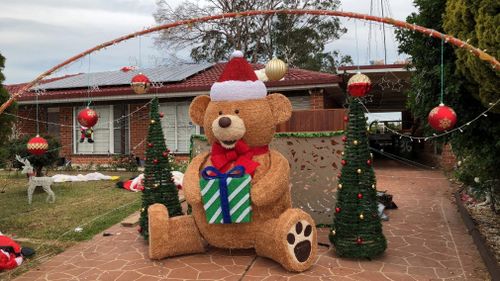 A giant teddy stolen from outside a Sydney home is back on display, helping its owner raise funds for charity.