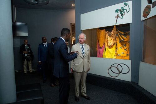 Prince Charles visits an exhibition of the personal effects of some of those killed at the Kigali Genocide Memorial in Rwanda's capital Kigali on Wednesday, June 22, 2022. 