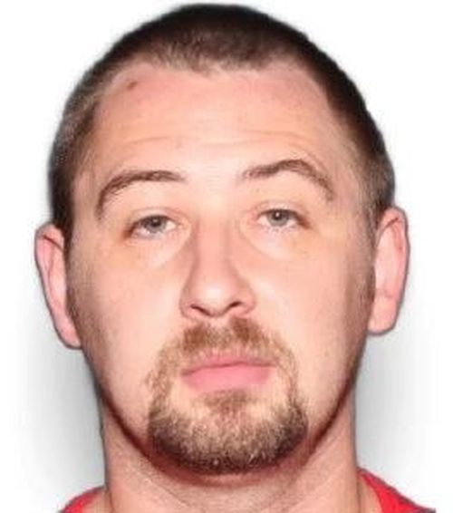 This photo provided by the Tennessee Bureau of Investigation shows Austin Robert Drummond, accussed of murder in Tennessee, United States.