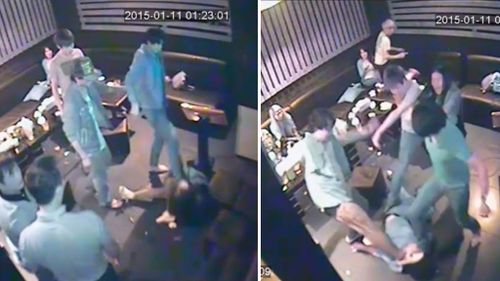 Police are searching for a group of men and women who kicked and stomped on a couple in a Melbourne karaoke bar. (Victoria Police)