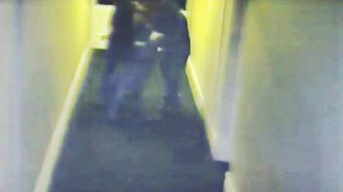 Detectives are hunting for two men who were caught on CCTV at the Premier Hotel in Albany, where they assaulted the manager and stole cash, before setting fire to the building.