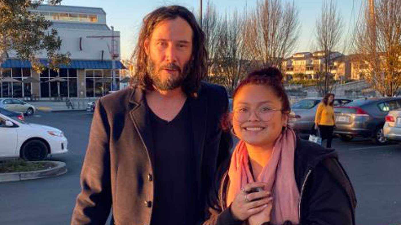 Keanu Reeves poses for a photo with fan after spotted eating ice cream ...