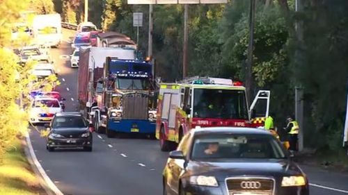 Cyclist and driver in hospital after crash causes peak hour chaos in Sydney