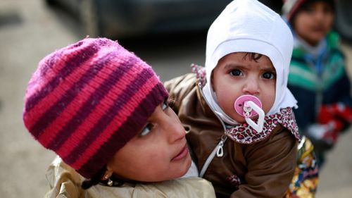 Desperate 'thousands' await evacuation from Aleppo