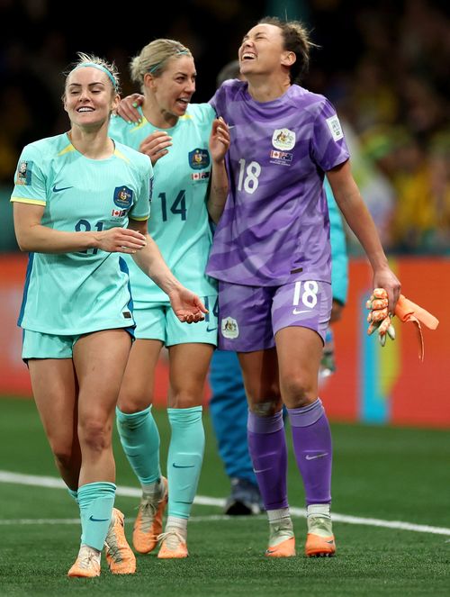 Ellie Carpenter, Alanna Kennedy and Mackenzie Arnold celebrate the team's 4-0 victory over Canada,