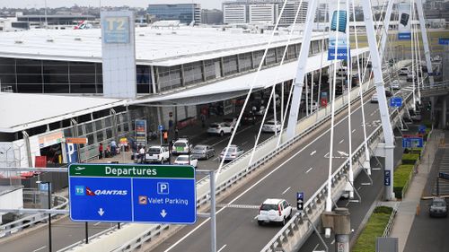 A 33-year-old man was arrested as he got of a flight at Sydney international Airport.