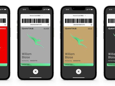 Phones with apps that display the Qantas green tier.