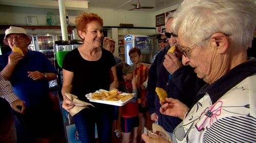 Senator Pauline Hanson helping out a Queensland takeaway shop.