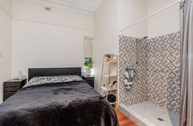 The disconcerting layout design in this Adelaide home sees the shower literally just a step or two from the bed.
