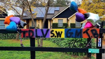 Coloured balloons line the streets in the Wollondilly Shire in remembrance of the teenagers. 