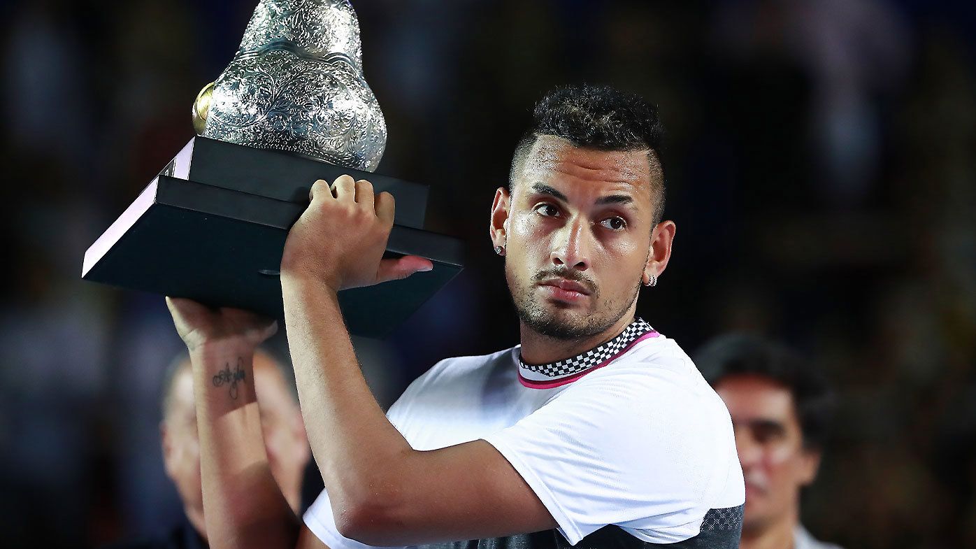 Nick Kyrgios pictured lifting the title in Acapulco after beating Alexander Zverev in the 2019 Mexican Open