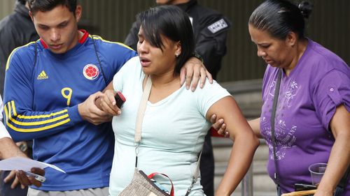Seventeen people have been killed at a crowded nightclub in Venezuela's capital on Saturday after a tear gas device exploded during a brawl and triggered a desperate stampede.