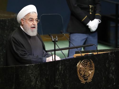  Iranian President Hassan Rouhani accused the United States on Tuesday of trying to overthrow his government, rejecting bilateral talks.