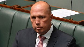 Peter Dutton said his opponent was 'using her disability as an excuse' for not moving to the electorate.