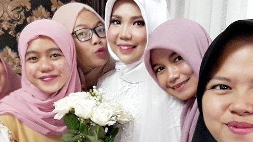 A selfie posted on Instagram of Indonesian bride Intan Syari in her wedding dress on what was intended to be her wedding day before her fiance's tragic death.