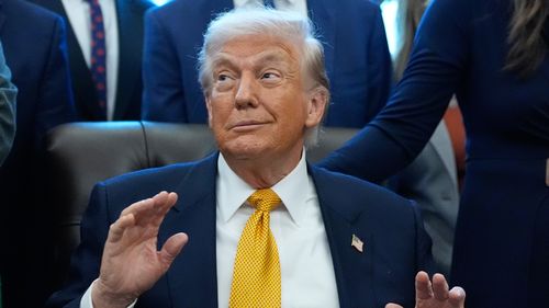 President Donald Trump speaks in the Oval Office of the White House, Wednesday, Jan. 14, 2026, in Washington. (AP Photo/Alex Brandon)