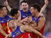 Lions pull off historic win to book in grand final do-over