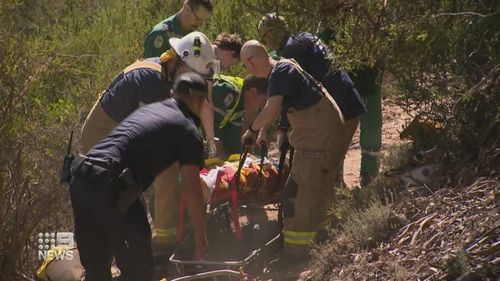 The man was out riding with his family when he crashed into dense bushland at the Eagle Mountain Bike park.