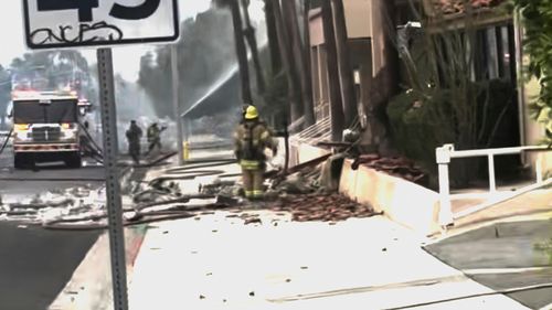 This image provided by Nima Tabrizi shows firefighters at the scene of an explosion at Palm Springs, Calif., on Saturday